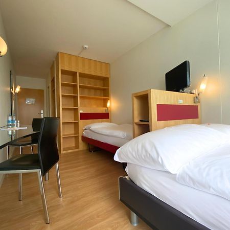 Hotel Seaside Spiez Esterno foto