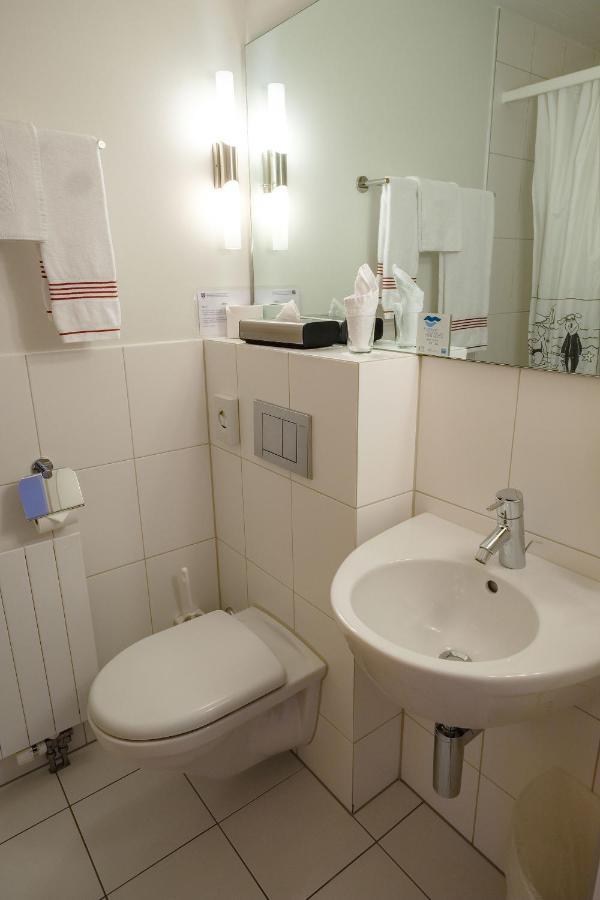 Hotel Seaside Spiez Esterno foto