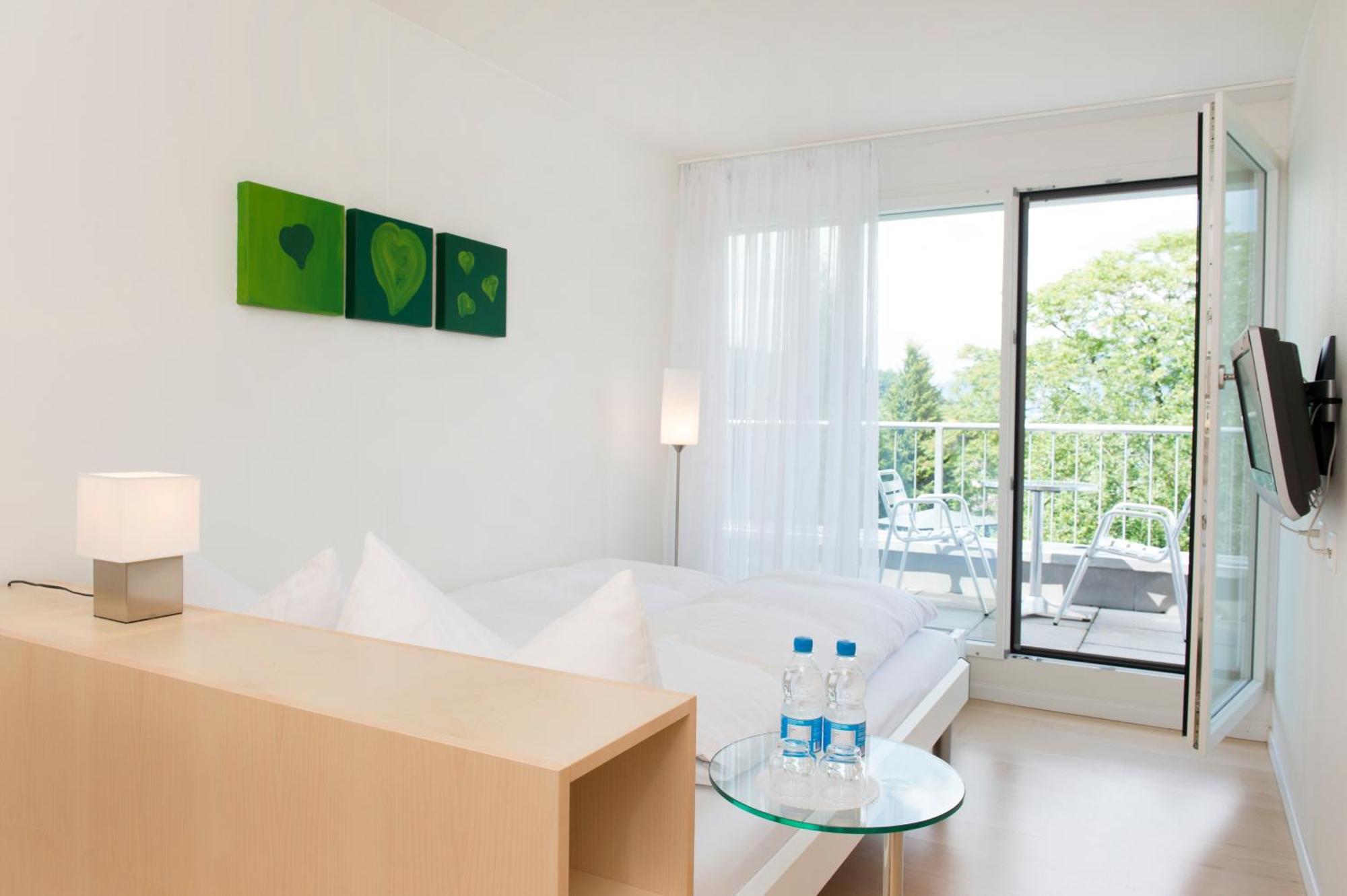 Hotel Seaside Spiez Esterno foto