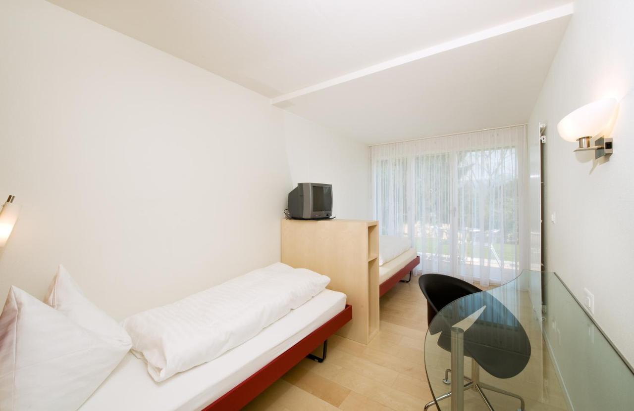 Hotel Seaside Spiez Esterno foto